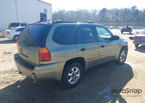 2003 GMC Envoy Sle z USA, uszkodzony, nr VIN 1GKDT13SX32319317